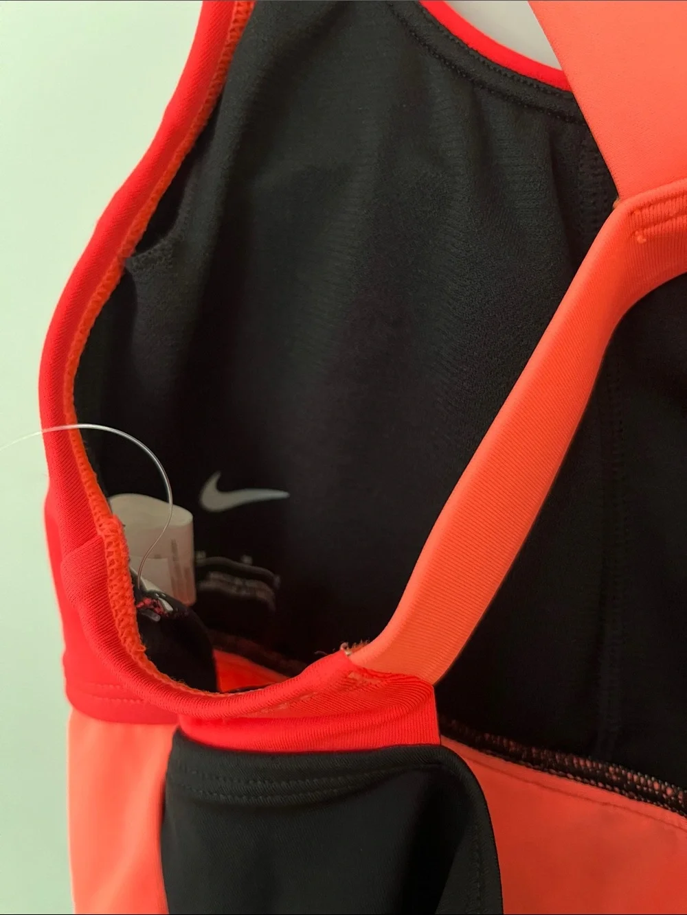 Nike women Colorblock One-Piece in Neon Pink, Coral & Black